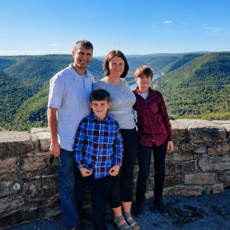 Tim Emerick with his wife Robin, and their two sons Ottis and Ozzy